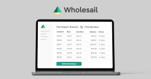 A screenshot of the Wholesail dashboard on a laptop mockup