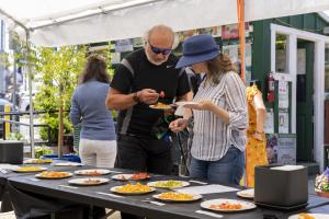 Attendees at the Anawalt tomato tasting