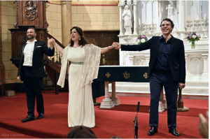 Award-winning Singer Cristina Fontanelli, tenor and Ricardo Rivera, baritone singers taking a bow after the concert at the Basilica of the Sacred Hearts in Southampton NY