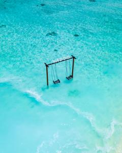 The iconic water swing at Adaaran Prestige Vadoo