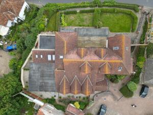 Drone Surveyor Aeriel Shot of Pitched Roof