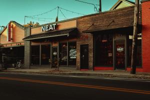 Image of Neat from the outside, which is located on Bardstown Rd, along the historic Kentucky Bourbon Trail