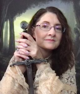 Sandy Lender holds a sword for epic fantasy author photo shoot