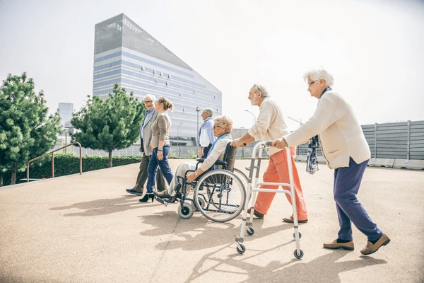 Elderly seniors living independently and joyfully using advanced mobility aids.