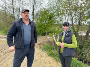 Couple standing on their farm