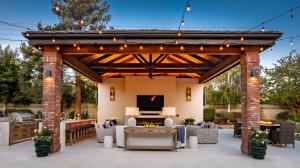 Wendy Glaister Interiors' luxury Outdoor Oasis features a high-end outdoor design with multiple areas for entertaining and everyday engagement.