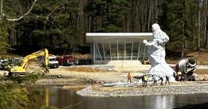 Lady Kindness, America's tallest freestanding marble sculpture, stands under wraps at the Cadobaz Estate, in Courland, Ohio during installation.