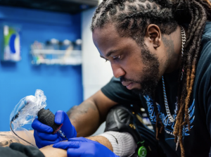 JBreeze, Providence Rhode Island Tattoo Shop Owner