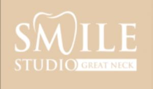 Smile Studio's logo, the m in smile has a design to look like a tooth