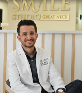 Dr. Avy Ariyev, DDS smiling at the camera