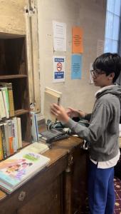 Rohan Verdonck's Community Library at the Roosevelt Hotel Migrant Center, New York, New York