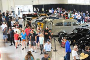 People checking out the hot rods and classic cars