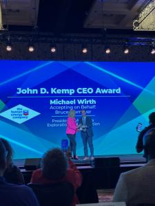 Bruce Niemeyer of Chevron accepting the John D. Kemp CEO award for Chevron CEO Mike Wirth. Photo Courtesy Jessica Tuman of Voya Cares