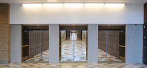 Before: A school hallway lined with closed, traditional-style doors.