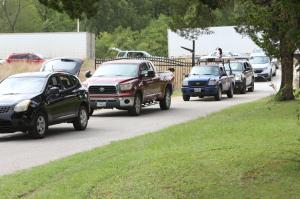 Lines of Cars as Families wait to be Served During Food Distribution Event.