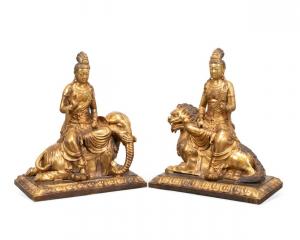 Large pair of Chinese gilt bronze Guanyin figures seated on a recumbent elephant and guardian lion, raised up on a rectangular plinth with a border of lotus petals (est. $5,000-$7,000).