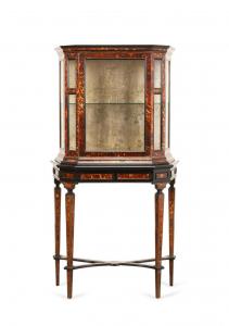 19th century continental parcel ebonized and shell veneer vitrine cabinet with a shaped cornice, glazed door and sides, a single glass shelf, and antiqued silver leaf floral urn back panel (est. $3,000-$6,000).