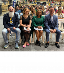 A group photo featuring Pergentino Vasconcelos Jr., Tatiane Bellettini, Dr. Natalicia Tracy, and Dr. Rony Jabour standing together at UNESC.