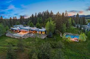Lush gardens, water features, and sought-after pickleball court