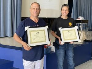 Pictured: Brian Baker and Melinda Leavings with their award plaques