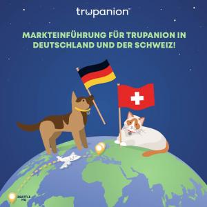 illustrierter Hund und Katze mit einer deutschen und einer Schweizer Flagge. Auf dem Foto ist zu lesen, dass Trupanion in Deutschland und der Schweiz eingeführt wurde.