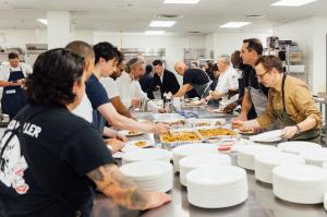 Chefs in the kitchen at last year's Feed Your Mind Gala, an annual event that unites culinary excellence with a mission to foster food education in classrooms across the nation.