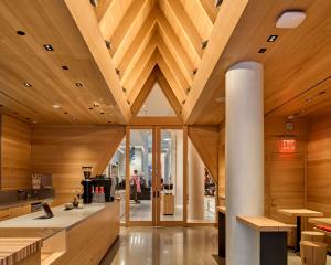 Image shows the interior of the A-Frame Cafe, inside the Arc'teryx 580 Broadway retail space in NYC.
