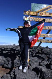 UAE Resident Businesswoman and Mother of Four, Sofya Shamuzova, Triumphantly Summits Kilimanjaro with UAE Flag