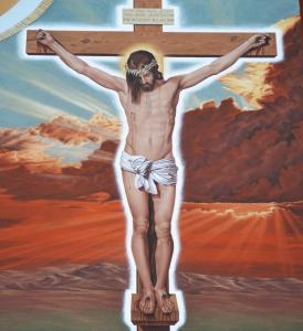 This painting is made with only natural color volcanic sand with tans, reds, blues, greens, oranges, browns, it is of Jesus Christ nailed to a cross wearing a crown of thorns and a perfectly white loincloth around his waist, bleeding from his hands, feet