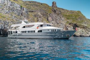 The yacht Galaxy Diver II, the newest luxury dive liveaboard vessel in the Galapagos fleet in front of Darwin Island, Galapagos