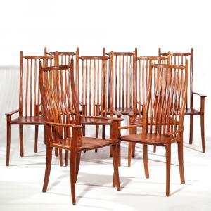 This set of 8 circa 2001 Stephen Swift ash and cherry high back dining armchairs, signed on the bottom, should fetch $4,000-$6,000. The chairs were custom ordered for a Briarcliff, N.Y. lady.