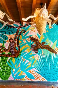 Hacienda Tres Ríos Crowns its Renovation with the Creation of a Colorful Mural in its Mexican Restaurant