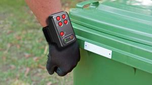 Partitalia's Discovery Mobile 3.0 wearable RFID reader reads RFID tag on waste bin