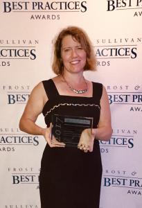 Dr. Baxter Accepts Frost & Sullivan Award for Pain Care Labs