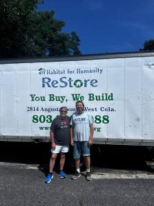 Rick Mantei Standing Outside Of Ebony Build House