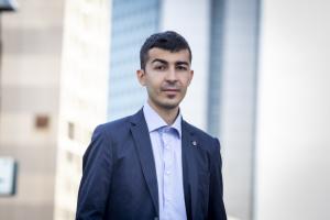 Francesco Denittis, Branding Consultant at Human Centric Group, wearing professional attire, smiling confidently while discussing back-to-school marketing insights