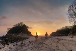 Horseback riding at sunset - Nosara, Costa Rica