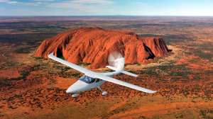 Smartflyer Electric Aircraft flying above Uluru in Central Australia