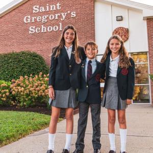 Gracie Clark with her siblings in front of Saint Gregory's School in Loudonville, NY