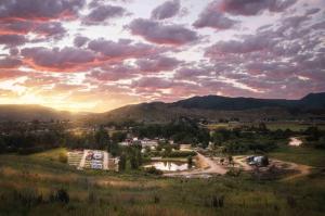 Overview of Echo Island RV Park at sunset with a brilliant and colorful sky