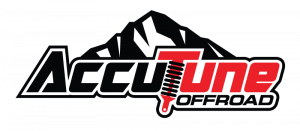 Accutune Logo features bold black and red italic lettering with a shock as the T in front of a mountain scene