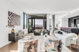 Image of upscale apartment interior living room and kitchen area