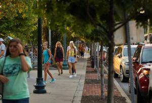 people walking around historic Westport.