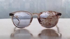 John Lennon's bloody glasses, photo by Yoko Ono