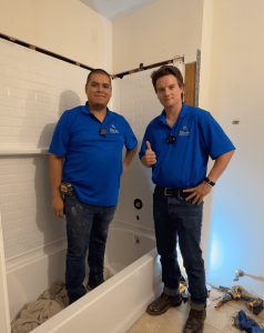 J. Blanton Plumbing technicians performing a bathroom remodel, showcasing their expertise in bathroom plumbing, Chicago sewer repair, and complete bathroom remodel services through Baths by J Blanton.