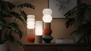 A trio of STAK Modular Lamps creates a warm, elevated ambiance to any space.