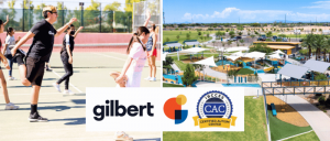 Participants stretch during an outdoor activity at a sports facility, accompanied by the Gilbert town logo and the IBCCES Certified Autism Center™ (CAC) seal, with a view of a nearby recreational park in the background