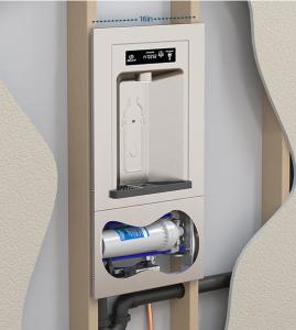 A bottle filler within a 2x4 wall between 16in center studs, with compact drain placement and interior workings visible.