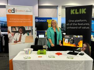 Georgina Taylor stands ready to inform guests about the merits of the KLIK system for classrooms.