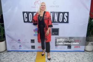 Hazel Ortega arriving at Teatro Xola, posing at the press wall before her talk. The event was sponsored by the High Tide Global Foundation, which she directs. The theater play Cosa de Niños, addressing bullying and violence, was presented before her inspiring conference